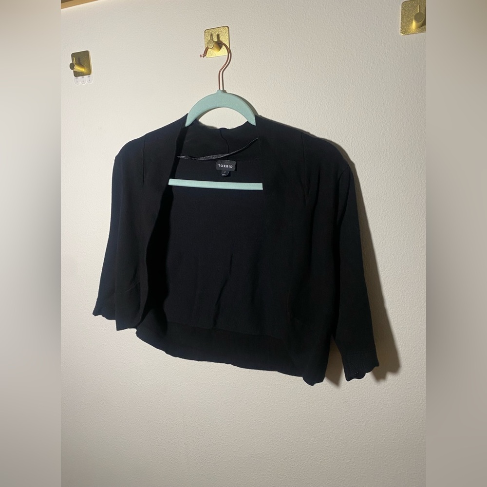 Cute black 1/2 sleeve shrug worn once.